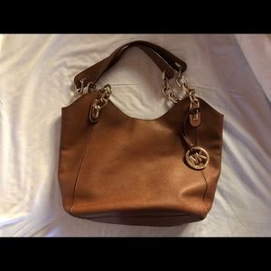 Genuine Michael Kors shoulder bag and wallet.